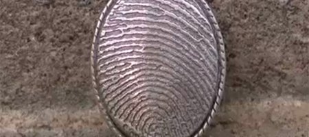 Metal Detectorist Reunites LI Man With Locket Containing His Brother's Ashes