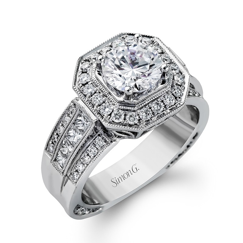 14K WHITE GOLD KNIFE EDGE SEMI MOUNT WITH .11CTTW SI CLARITY & GH COLOR DIAMONDS IN THE HIDDEN HALO AND PRONGS FOR A 2CT ROUND