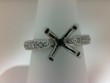 14K WHITE GOLD SEMI MOUNTING WITH .20CTTW ROUND SI CLARITY & G COLOR DIAMONDS SET IN THE TWISTED SHANK