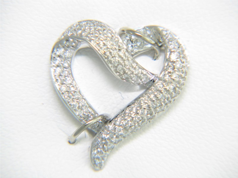 14K WHITE GOLD CIRCLE PENDANT WITH .24CTTW ROUND AND BAGUETTE I1 CLARITY & HI COLOR DIAMONDS O A CABLE CHAIN