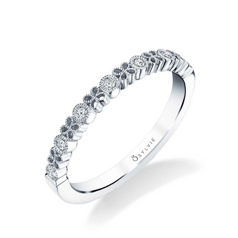 PLATINUM WEDDING BAND WITH .08CTTW ROUND SI2 CLARITY & HI COLOR DIAMONDS SET WITH A BEAD DESIGN FINGER SIZE 3.75