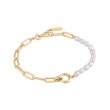 Pearl Chunky Link Chain Bracelet?Get playful with trends this season with this chic pairing of chunky gold chains and a row of glistening pearls. This link bracelet is the perfect statement piece to add texture and style to your look in a bold and contemp