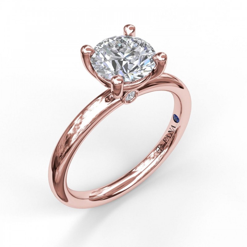 14K ROSE GOLD SOLITAIRE SETTING WITH A.02CTTW ROUND VS CLARITY & G COLOR DIAMONDS SET UNDER THE FOUR PRONG HEAD