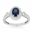 14K WHITE GOLD RING WITH A 1.00CT OVAL SAPPHIRE AND .34CTTW ROUND I1 CLARITY & HI COLOR DIAMONDS SET IN THE HALO AND DOWN THE SHANK