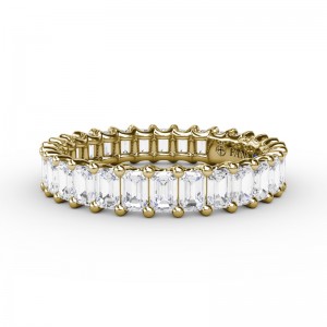 14K YELLOW GOLD BAND WITH 1.45CTTW SI CLARITY & G COLOR EMERALD CUT DIAMONDS SET 60% OF THE WAY AROUND FINGER SIZE 6.75