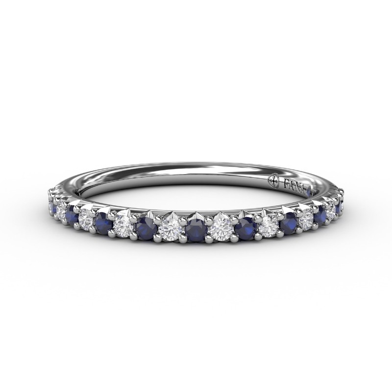 https://www.nfoxjewelers.com/upload/product/PLATINUM SHARED PRONG BAND WITH .13CTTW ROUND SI CLARITY & G COLOR DIAMONDS ALTERNATING WITH .21CTTW ROUND LONDON BLUE TOPAZ FINGER SIZE 7