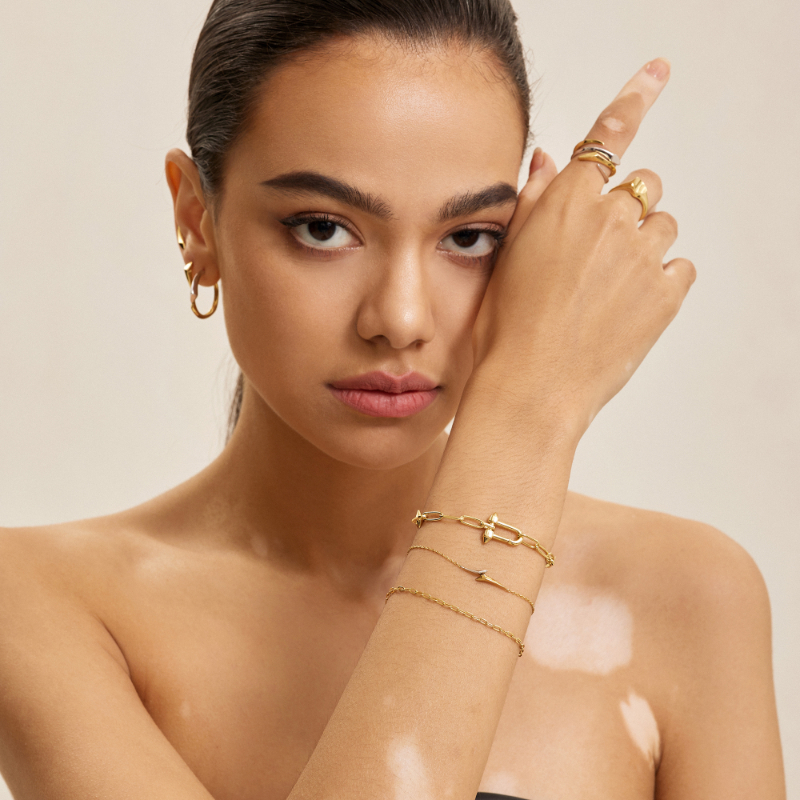 ANIA HAIE 14K GOLD PLATED ON STERLING SILVER AND STERLING SILVER ARROW CHAIN BRACELET