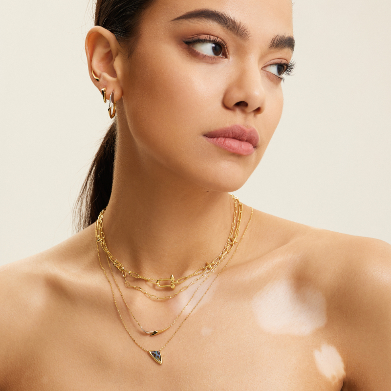ANIA HAIE 14K GOLD PLATED ON STERLING SILVER AND STERLING SILVER TWO TONE ARROW HOOP EARRINGS